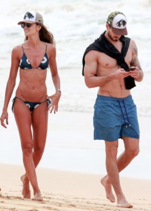 Izabel Goulart in Bikini and Kevin Trapp on the beach in Fernando de Noronha