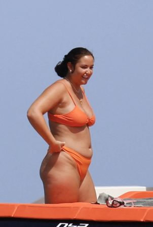 Jacqueline Jossa - In an orange bikini ona a yacht in Formentera
