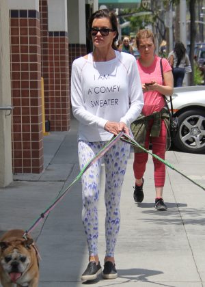 Janice Dickinson walking her two dogs in Beverly Hills