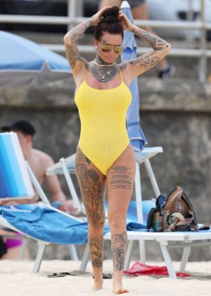 Jemma Lucy in Yellow Swimsuit on the beach in Sydney
