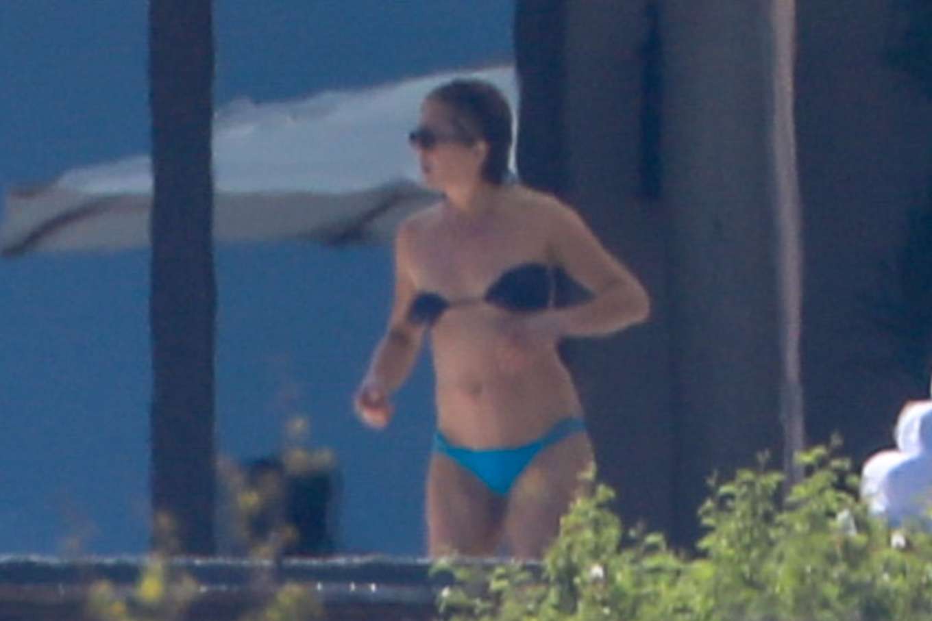 Jennifer Aniston in Blue and Black Bikini in Cabo San Lucas | GotCeleb