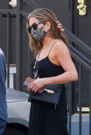 Jennifer Aniston - With bodyguard as she leaves a hair salon in Beverly Hills