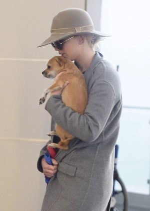 Jennifer Lawrence with her dog at JFK Airport in NYC