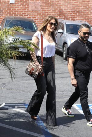 Jennifer Lopez - In black denim flare pants out for brunch in Los Angeles