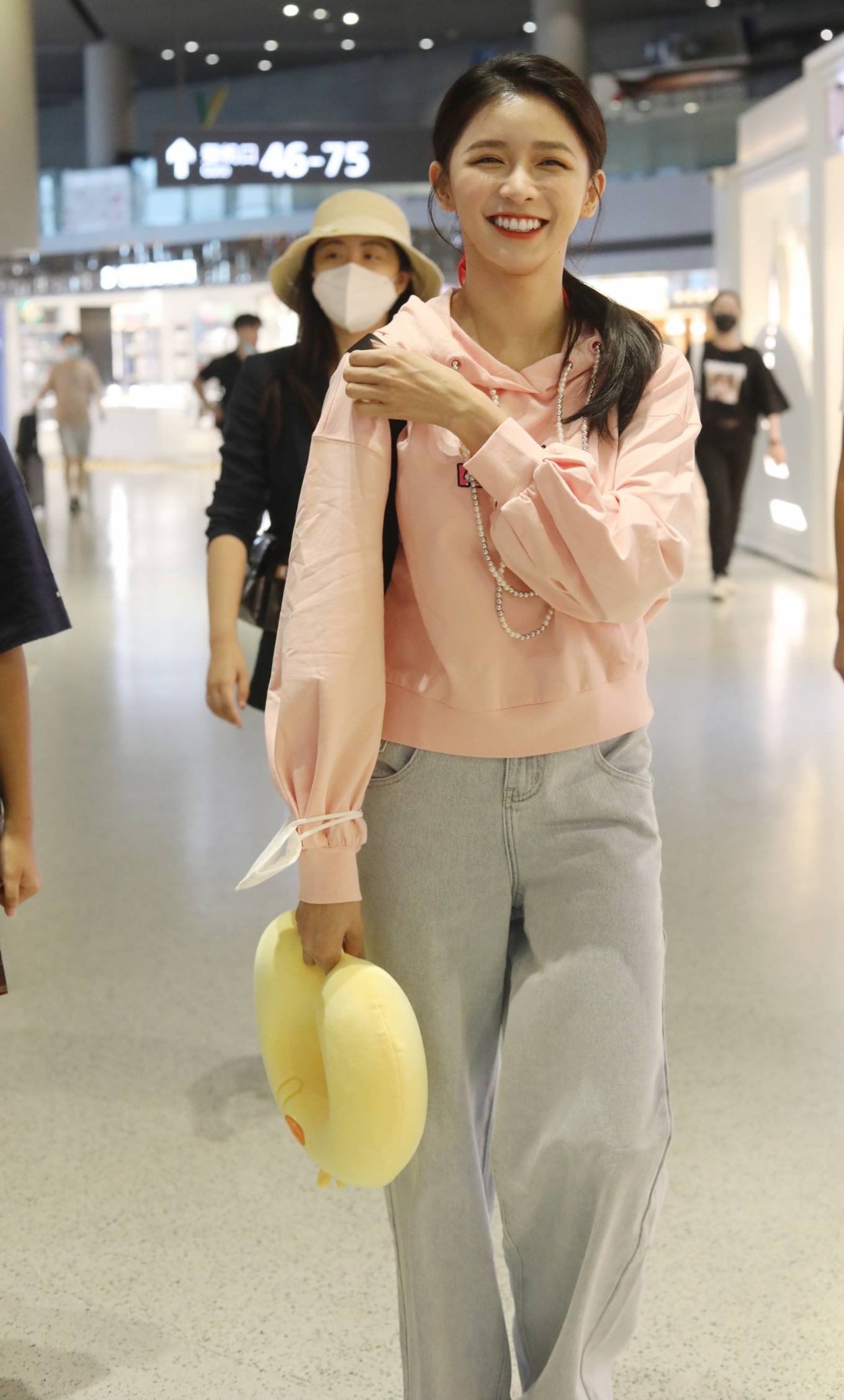 Joey Chua arrives at a Shanghai airport