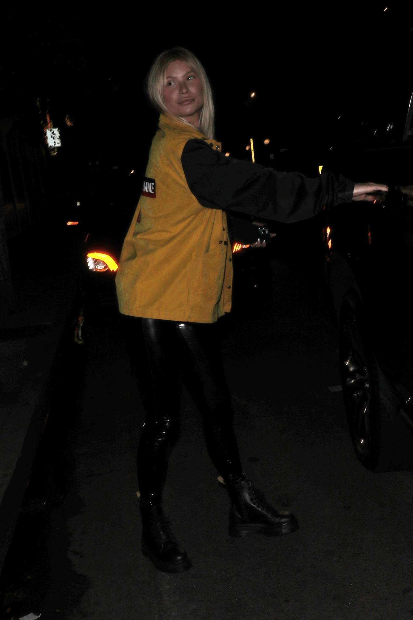 Josie Canseco - Wearing leather pants with the yellow fashion jacket at