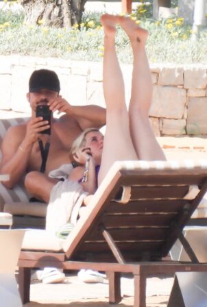 Katy Perry - Pictured in a purple swimsuit in Greek