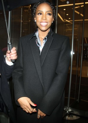 Kelly Rowland in black coat out in NYC