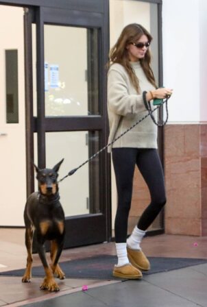 Kendall Jenner - Steps out with her Dobermann