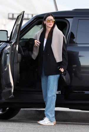 Kendall Jenner - Wearing Bottega Veneta and oversized orange lens glasses while out in LA