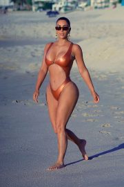 Kim Kardashian in Swimsuit on the beach in Cabo
