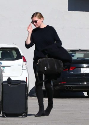 Kirsten Dunst in Black outfit out in Los Angeles