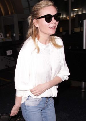Kirsten Dunst in Jeans at LAX airport in Los Angeles