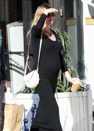 Kirsten Dunst in Long Black Dress in LA