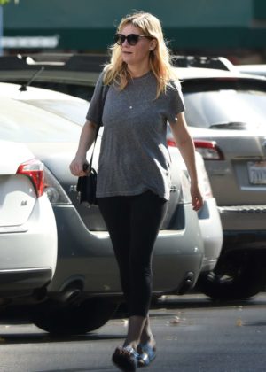 Kirsten Dunst in Tights Shopping in LA