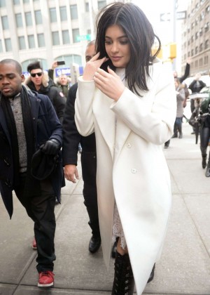 Kylie Jenner in White Coat Arrives at Her Hotel in NY