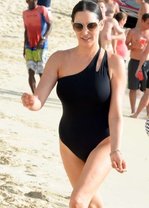 Lauren Silverman in Black Swimsuit at a beach in Barbados