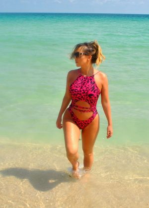 Lauryn Goodman in Pink Swimsuit at a beach in Cape Verde