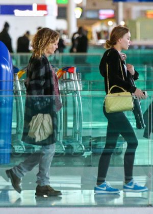 Lily Rose Depp and Vanessa Paradis at CDG Airport in Paris