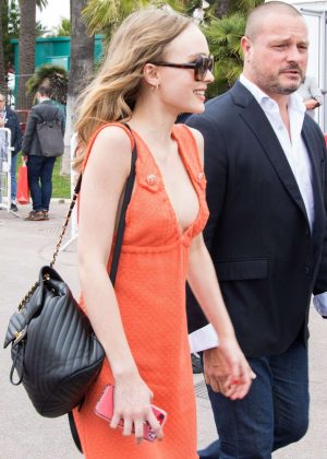 Lily Rose Depp in Orange Dress out in Cannes