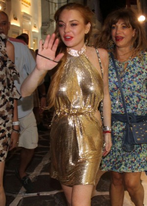 Lindsay Lohan in Gold Mini Dress Night out in Mykonos
