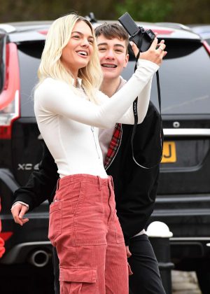 Louisa Johnson with a fan outside Key 103 Radio Station in Manchester