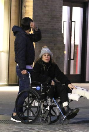 Luciana Gimenez - In a wheelchair after fracturing her leg in skiing accident in Aspen
