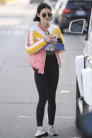 Lucy Hale smiles while on a coffee run after in Los Angeles