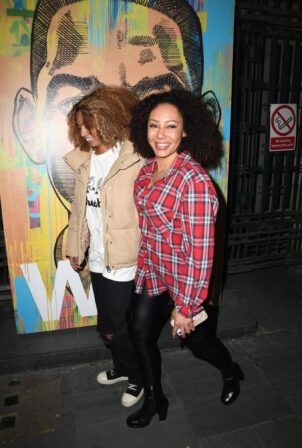 Melanie Brown - Waits on the steps next to the Savoy Theatre in London to see Will Smith