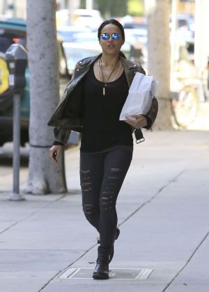 Michelle Rodriguez in Ripped Jeans Out Shopping in Beverly Hills