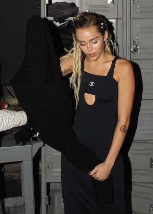 Miley Cyrus in Black Dress at 1OAK Nightclub in West Hollywood