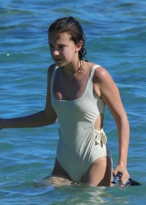Millie Bobby Brown in White Swimsuit on the beach in Honolulu ...