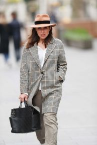 Myleene Klass in fedora hat and tweed coat upon her exit at Smooth Radio show in London