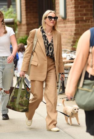 Naomi Watts - Is pictured with her pooch in New York