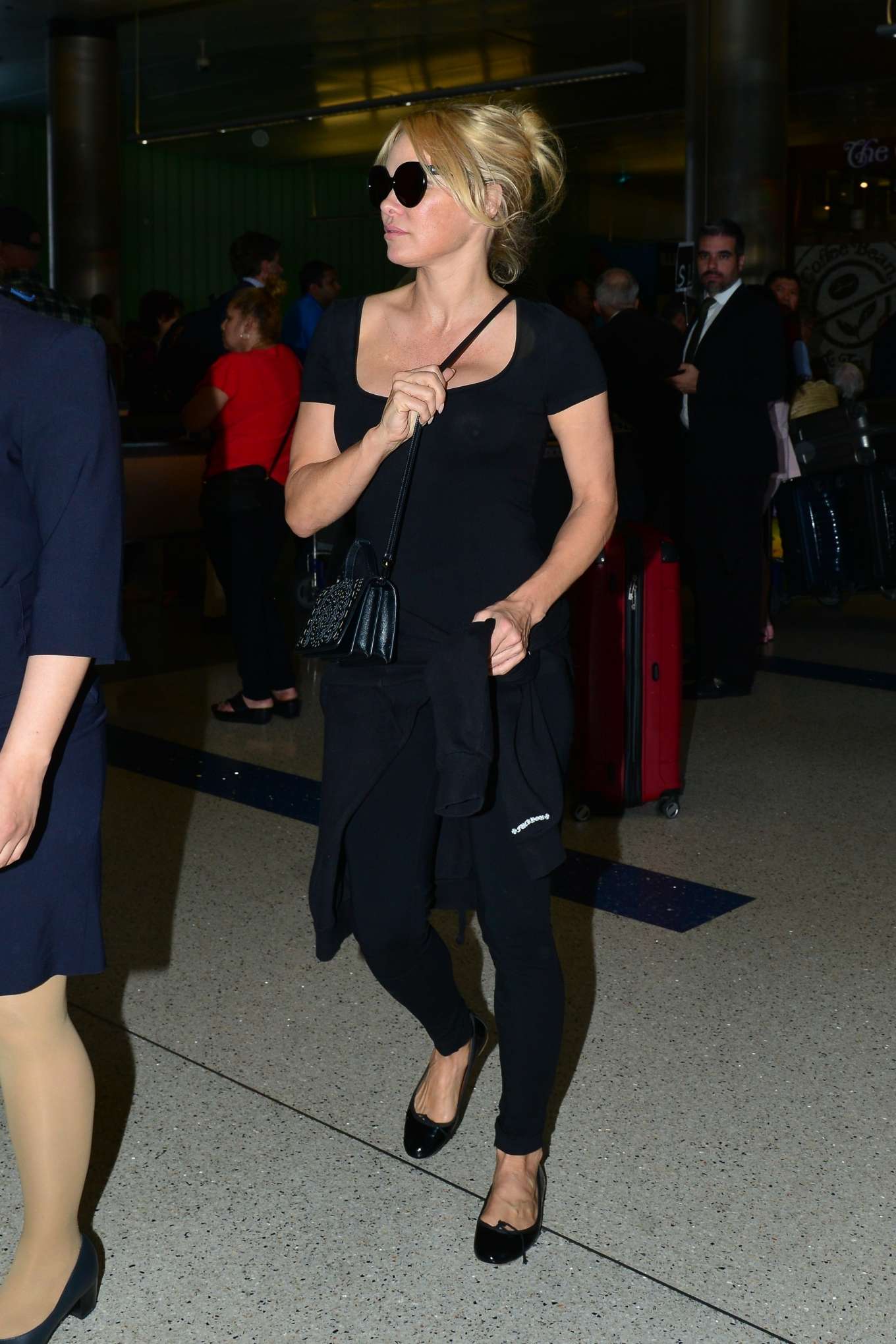 Pamela Anderson: Arrives at LAX International Airport-02 | GotCeleb