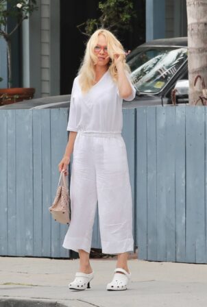 Pamela Anderson - Wears Crocs x Balenciaga mules while out in Venice