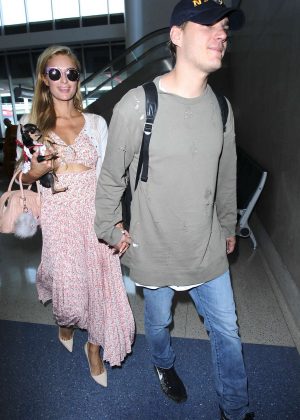Paris Hilton and Chris Zylka at LAX Airport in Los Angeles