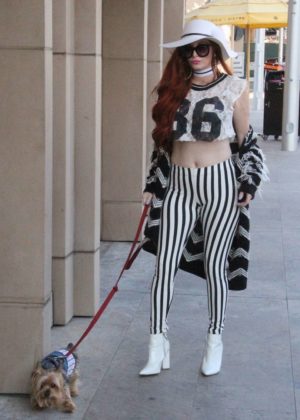 Phoebe Price out walking her dog Henry in Beverly Hills