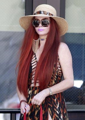 Phoebe Price walking her dog in Beverly Hills