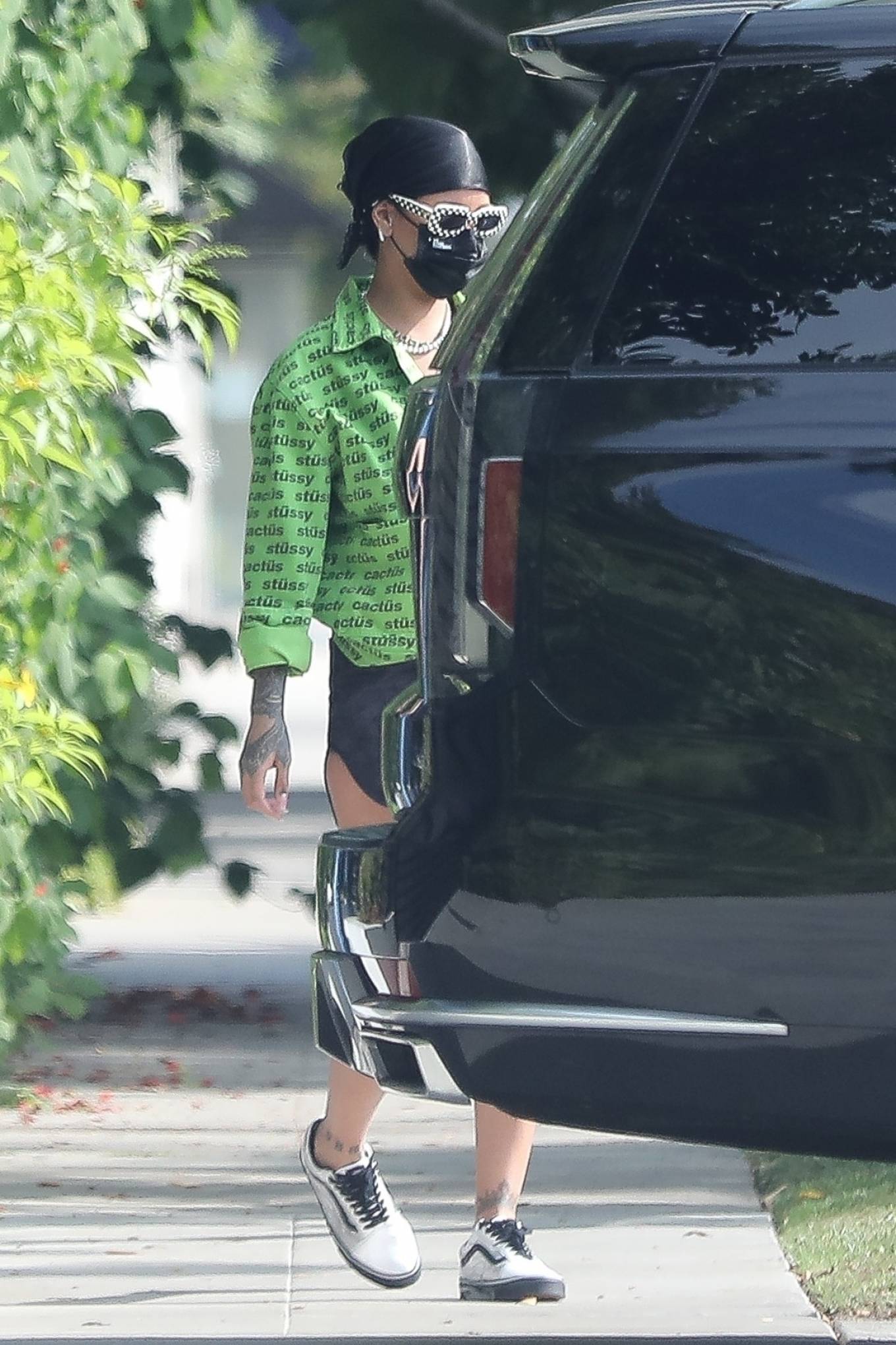Rihanna - Donss a green Stussy jacket and Vans shoes in Santa Monica-09 |  GotCeleb