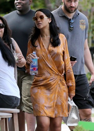 Rihanna in Mini Dress at a poolside bar in Miami