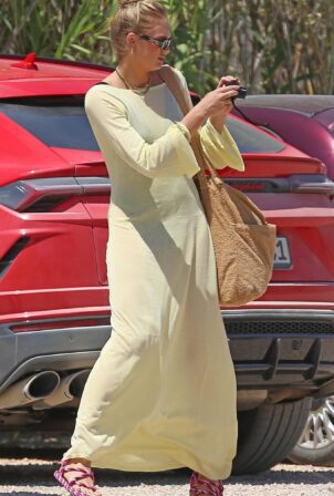 Romee Strijd - In a maxi yellow dress out for lunch at Casa Jondal in Ibiza