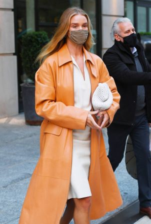 Rosie Huntington-Whiteley - With a coral-hued trench coat in New York