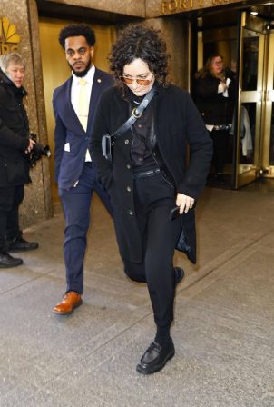 Sara Gilbert - Keeps a low profile while exiting NBC Studios in New York