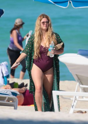Sasha Pieterse in Purple Swimsuit at the beach in Miami