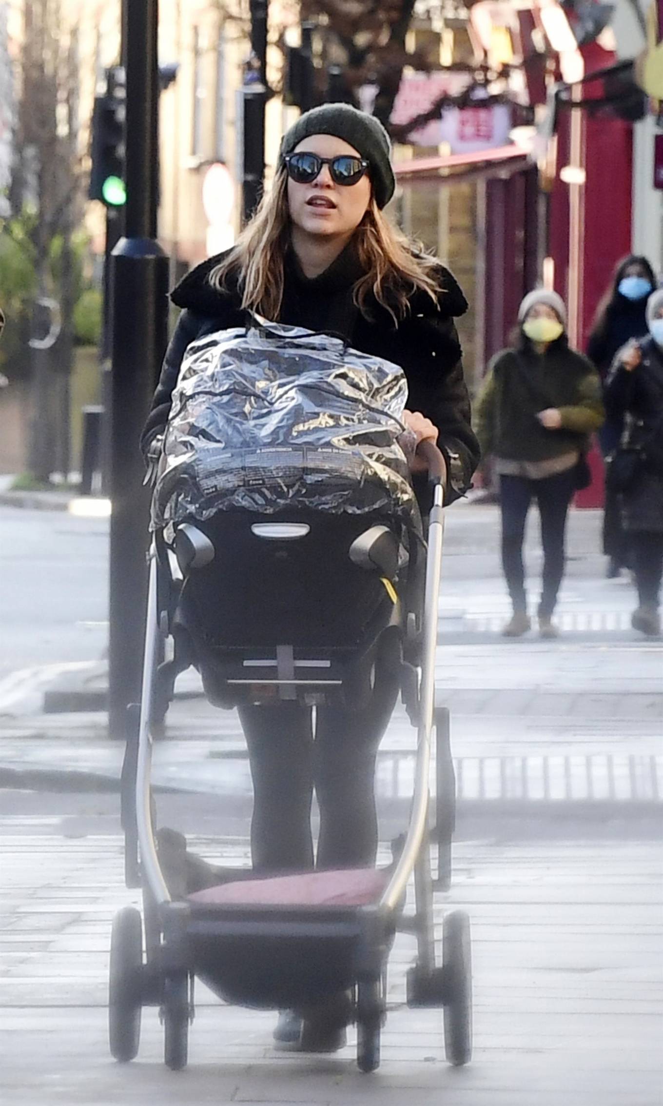 Sophie Cookson – With her newborn baby in London