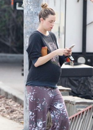 Whitney Port shows off her growing bump in her pyjamas in LA